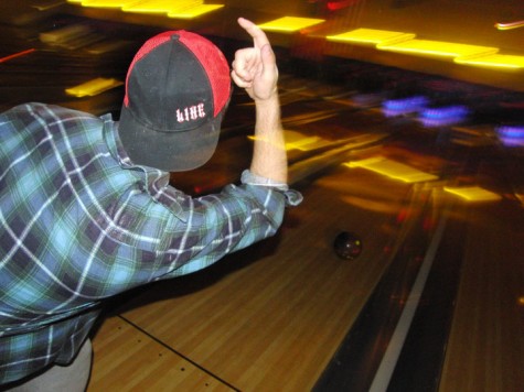 Cory Muscara, 12, a member of Phi Kappa Psi, participates in a school-sponsored bowling mixer with Alpha Chi Omega.