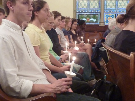 Students burn candles in Ford Chapel in memory of the lives lost on Sept. 11, 2001. PHOTO COURTESY OF HENRYK BRODER