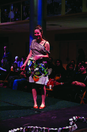 Students walk down the Campus Center runway wearing dress creations made of recyclable and reusable items for Alleghenys third annual Trashion Show, sponsored by Students for Environmental Action. NICK OZORAK/THE CAMPUS.