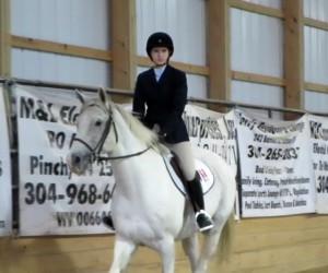 The next picture is of one of our freshmen, Bailey Kudla-Williams.   It was taken during her class at the West Virginia University Show on October 19th.  Bailey is one of the teams' riders in the Beginner division.  She took first place in this class.  A huge congratulations goes out to Bailey as this was her first time competing.  