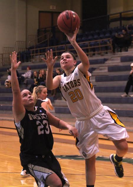 Emma Pellicano '16 shoots a layup on Wed. Jan. 22, 2013, in the Wise Center against Wooster. The teams played a close game, ending with a win in overtime by the Gators, 65-63.