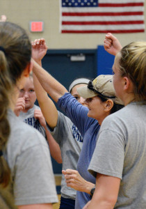 AMASA SMITH/THE CAMPUS Women’s Volleyball coach Bridget Sheehan is pictured with the team. The team won at a tournament last weekend and acheived Sheehan’s 600 career win.