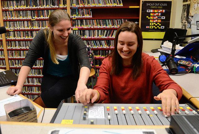 Kristen Migliozzi, ’17, and Jackie Verrecchia, ’17, manage the control board for their radio show. Verrecchia described their show as a time for them to play any music they feel.