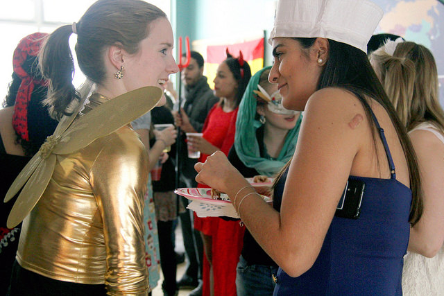 Isabel Choinowski (left) and Lorena Souza (right) dressed in costumes and attended the international carnival held in the Max Kade International Wing of North Village on Feb. 21, 2015. 