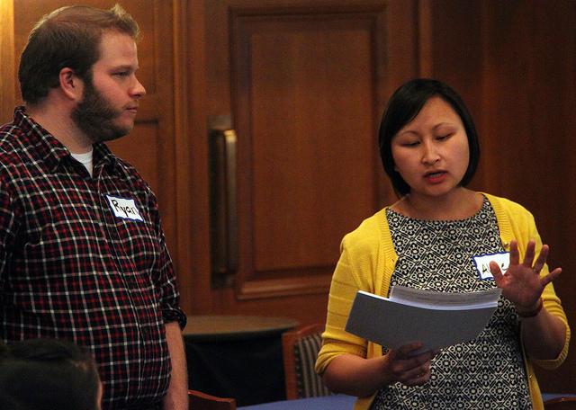 Ryan Pickering, assistant professor of psychology, and Aline Lo, assistant professor of English, speak to students and faculty who attended the first-generation dinner on April 16, 2015. 
