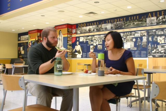 Assistant Professor of English Aline Lo and Assistant Professor of Psychology Ryan Pickering  have lunch outside of McKinleys Food Court on Tuesday, Sept. 15, 2015 from 12-1 p.m. inviting students to join them. 