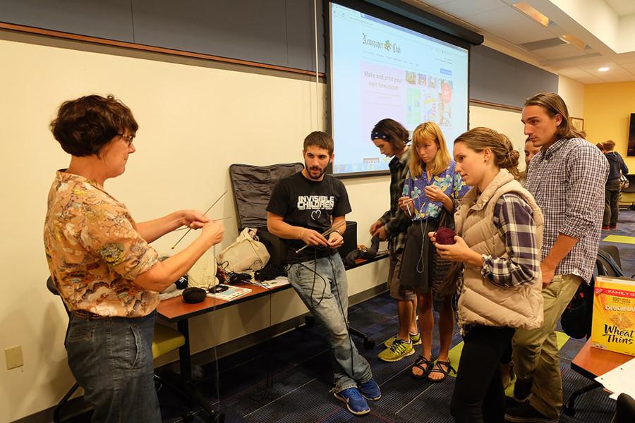 Guest lecturer Amanda Langdown, senior lecturer from the department of design at Manchester Metropolitan University School of Fashion teaches students to knit Tuesday, Sept. 22 as part of a one credit, weeklong sustainable fashion class at Allegheny College. 
