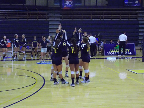 The women’s volleyball team gathers during the match against Fredonia on Tuesday, Sept. 1. 