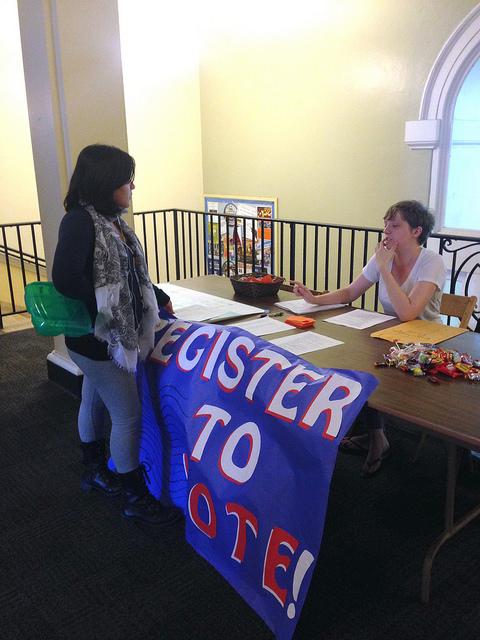 Heather Bosau, ’17, tables for the Center for Political Participation to register students to vote on Tuesday, Sept. 22, 2015.