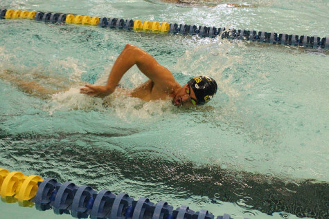 Brian Corletti, '19, races freestyle against Grove City. 