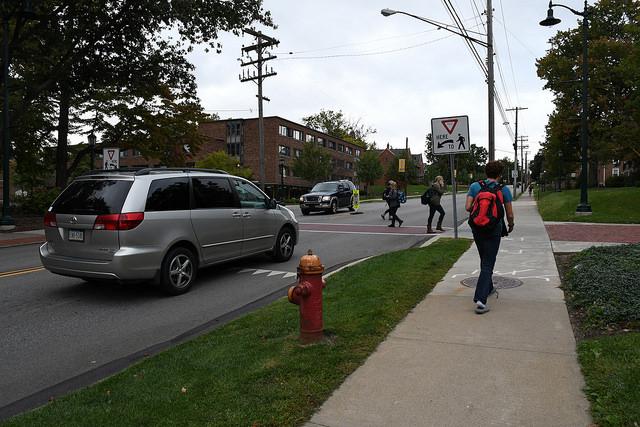 Students+use+the+crosswalk+on+North+Main+Street+in+front+of+Baldwin+Hall.+Cameras+were+installed+beginning+Tuesday%2C+Sept.+27%2C+2016%2C+to+study+traffic+patterns+on+the+road.