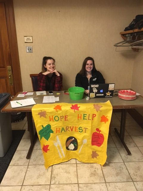 Allison Cosgrove, ’18, and Lindsay McParlane, ’18, sell tickets for the bake-off on Thursday, Dec. 1, 2016. All proceeds were donated to Hope, Help, Harvest, a nonprofit, student-run organization that raises money for food banks in Crawford County. 