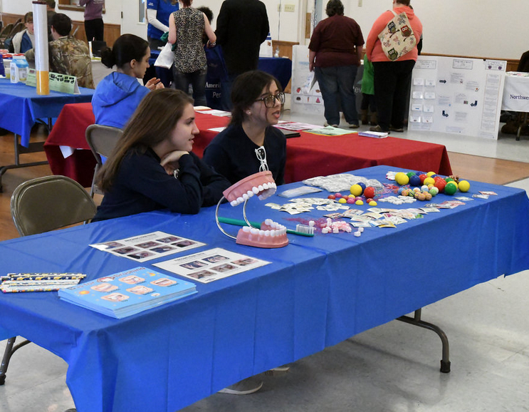 Allegheny College students Leah Sulecki, ’20, and Marison Cruz, ’20, volunteered at the annual Children’s Dental Health Fair organized by the Pre-Dental Society on Saturday, Feb. 18, 2017, at the Meadville Community Center. 