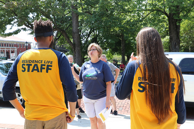 Linda Clune, senior associate director of admissions, directs two members of residence life staff of Baldiwn Hall on Saturday, Aug. 26, 2017. 