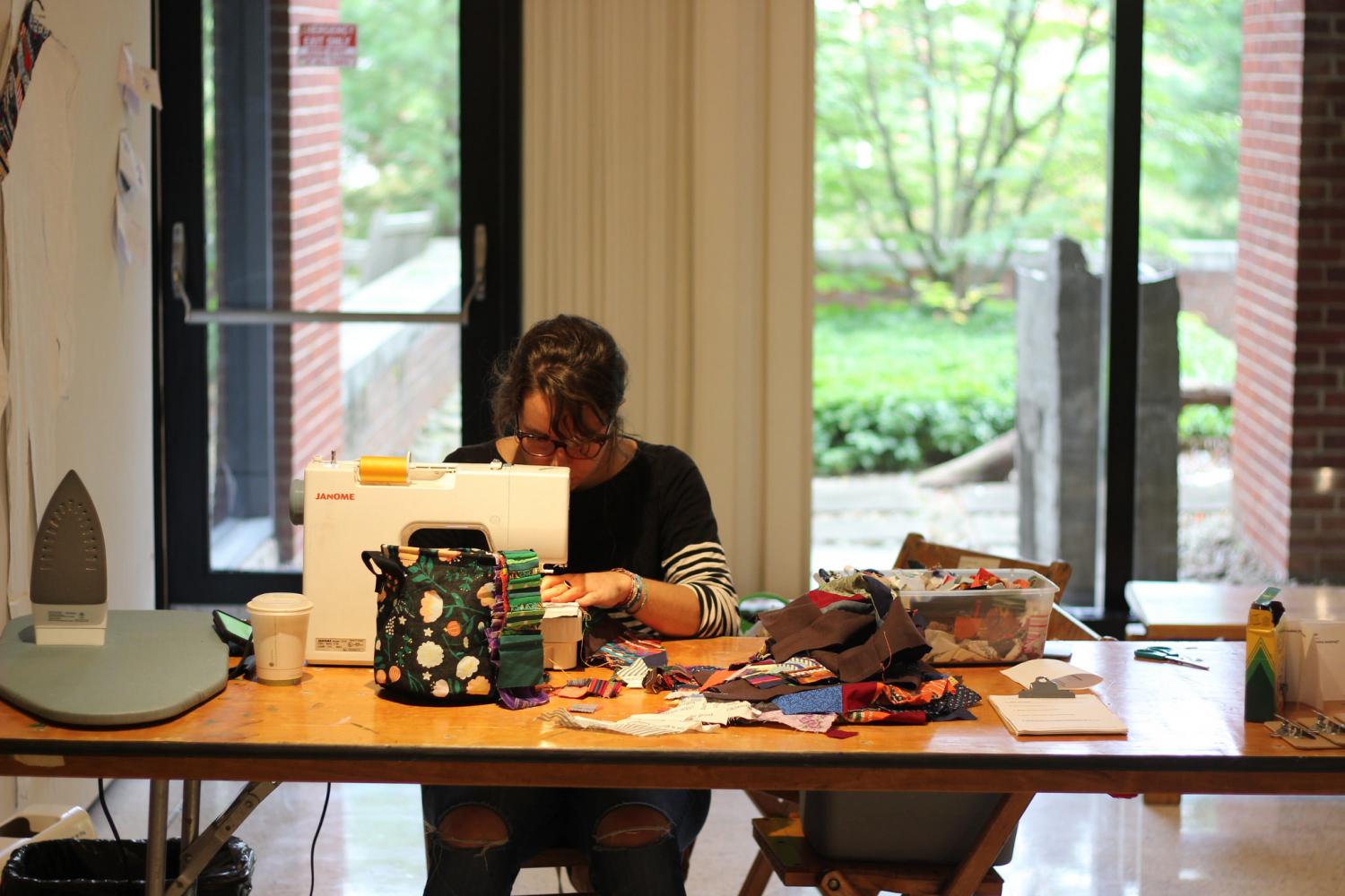 Paula Frisch, ‘11, works on her submission for the 8 Hour Project titled, A Quilt For Now: III