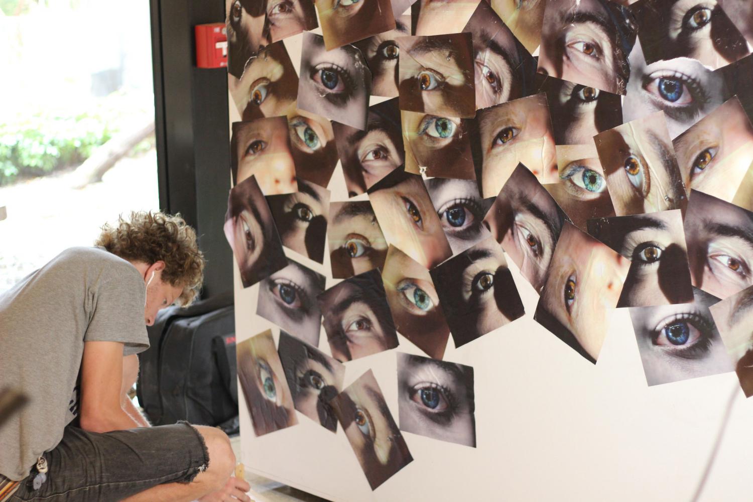 Jack Conant, ‘12, works on his piece, I Will Not Let Them See Me #0 on Sept. 2, 2017