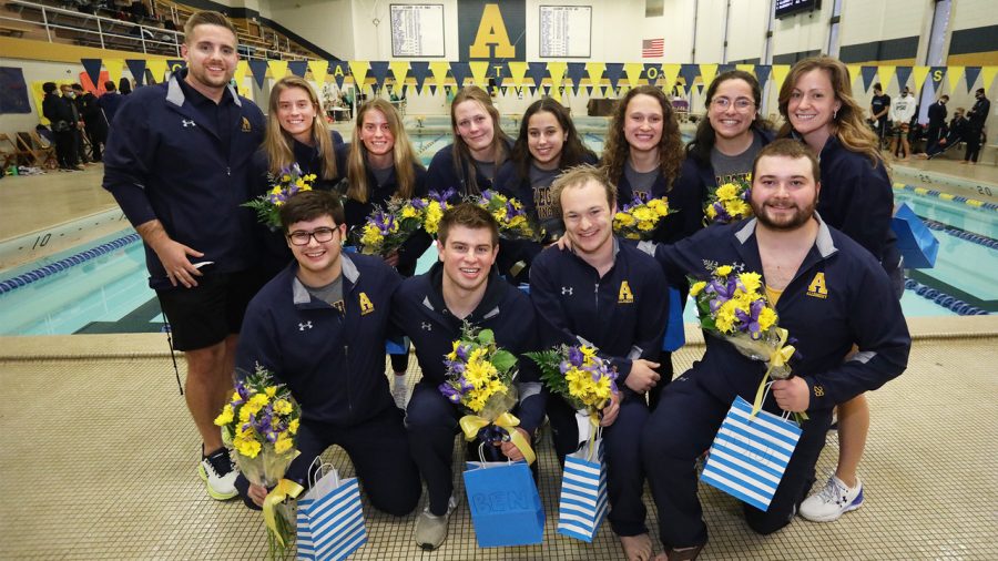 Senior+swim+and+dive+team+members+are+recognized+after+their+last+meet+at+Mellon+Pool+last+weekend.+