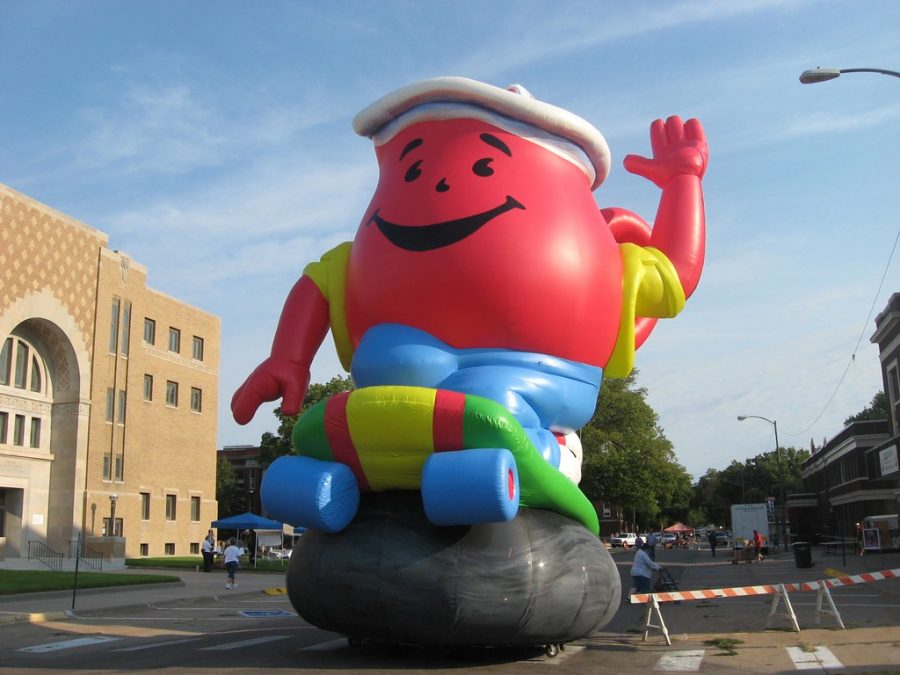 This is the Kool Aid Man riding a skateboard.