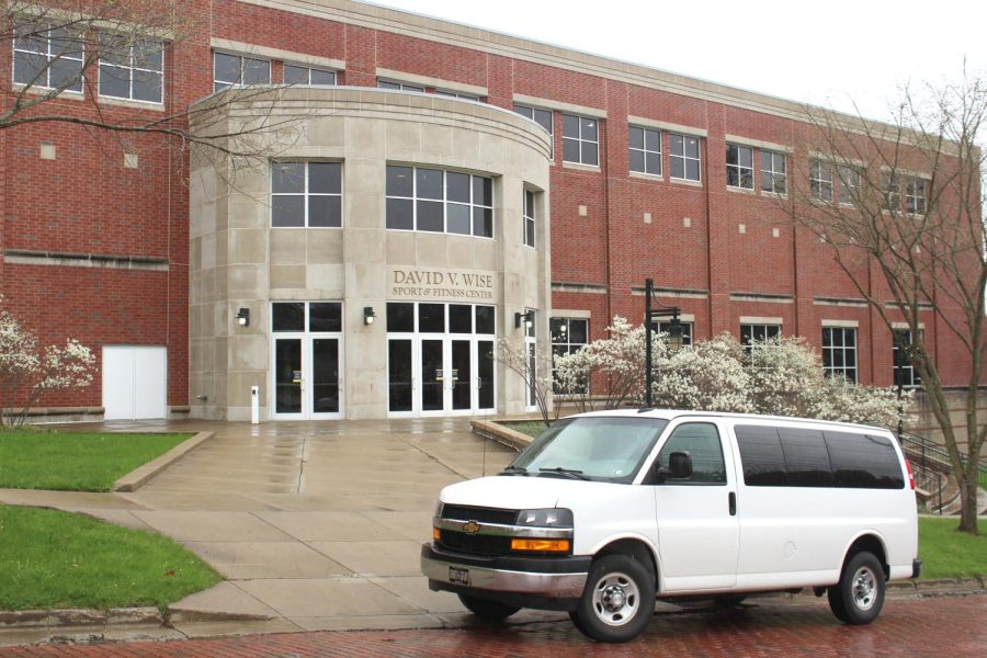 One of the Chevy Express cargo vans from the college’s motor pool idles on Highland Avenue outside the Wise Center. The vans shuttled students that had tested positive to the Quality Inn, and later, Ravine-Narvik Hall.