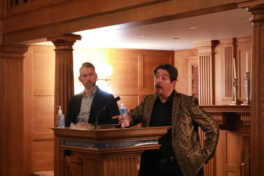 Visiting Professor of English Graham Barnhart, ’07, listens as Professor of English Matthew Ferrence discusses his writing process at the Single Voice Reading on April 14 in the Tillotson Room in the Tippie Alumni Center at Cochran Hall.