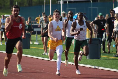 Tylir Shannon, ’22, sprints the final stretch of the men’s 200 meter race at the Marty Goldberg Invitational at Robertson Athletic Complex on Thursday, May 12. Shannon finished third in 22.49 seconds.