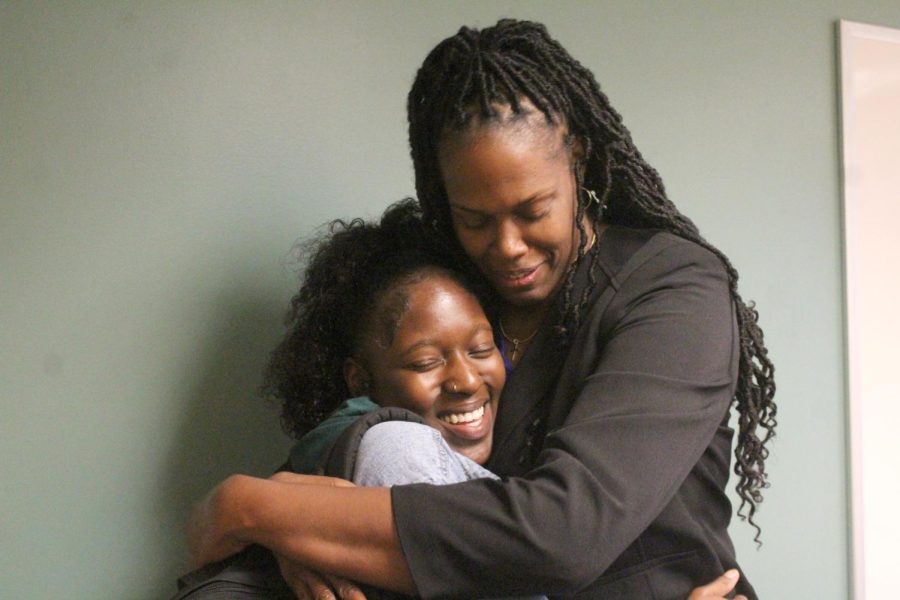 IDEAS Center Director Lisa Nicole Smith hugs Jada Thomas, 23, president of the Association for the Advancement of Black Culture, at a welcome reception for Smith in the Campus Center on Monday, Sept. 26.