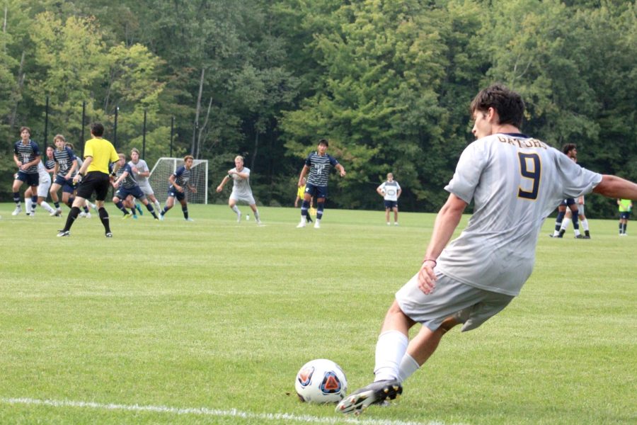 Cliff Weaver, 25, laces a free kick into Case Western Reserve territory during the second half of their game on Sept. 17 at Robertson Athletic Complex.