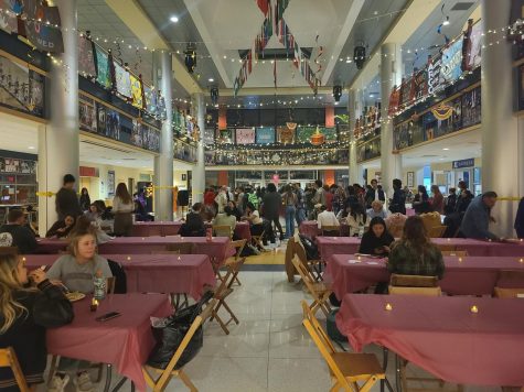 A wide angle of the Diwali event. SASS provided Indian food and an opportunity to get henna tattoos.