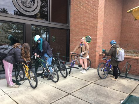 Bike Share members prepare to move the library bikes down to Loomis St. for winter storage in the bike shop. Students who wish to borrow a bike must wait until spring when bikes will return to the library, or contact Bike Share at bikeshare@allegheny.edu to make arrangements.