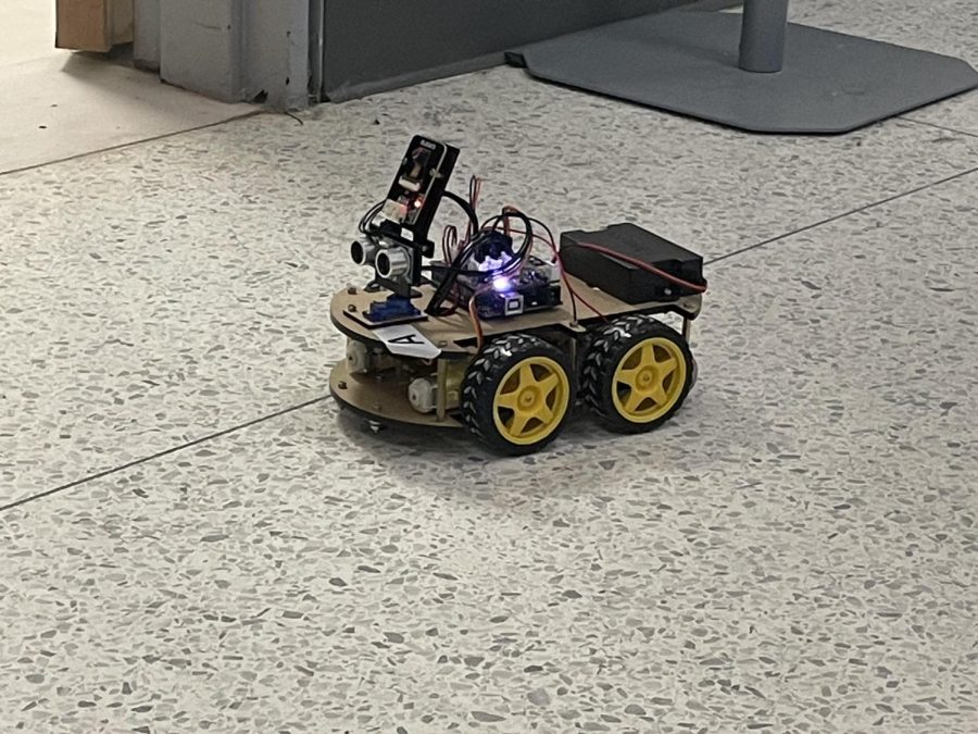 One group was given the chance to drive a robot with a remote across the lab floor during the Robotics Minor for the middle schoolers.