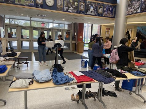 Members of Allegheny Student Government, Students for Environmental Action and Green Students of Color manage the thrift shop held in the lobby of the Henderson Campus Center on Tuesday, April 25.
