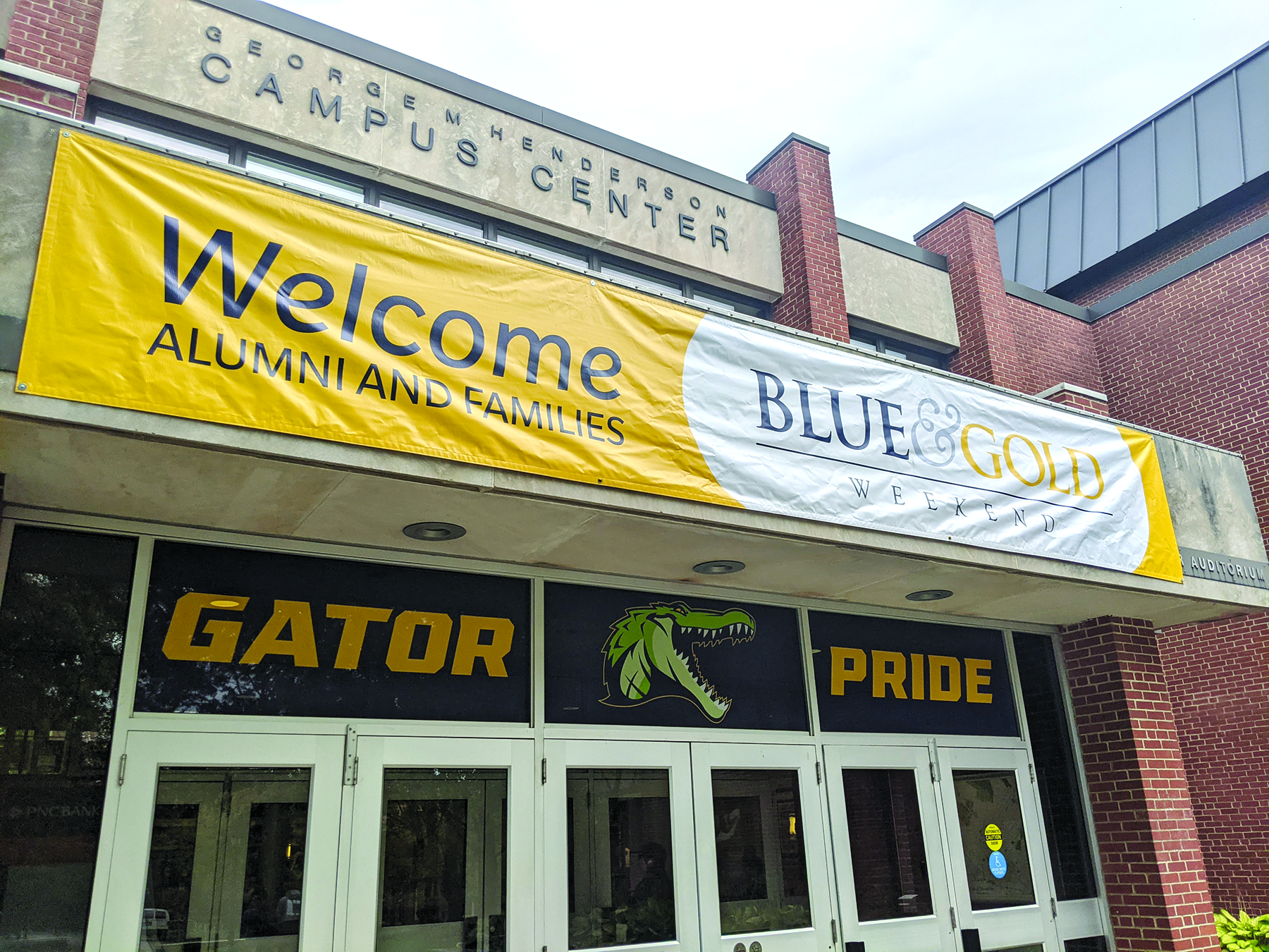 Decorations for Blue and Gold weekend hang from the front of the Henderson Campus Center on the afternoon of Thursday, Sept. 28.