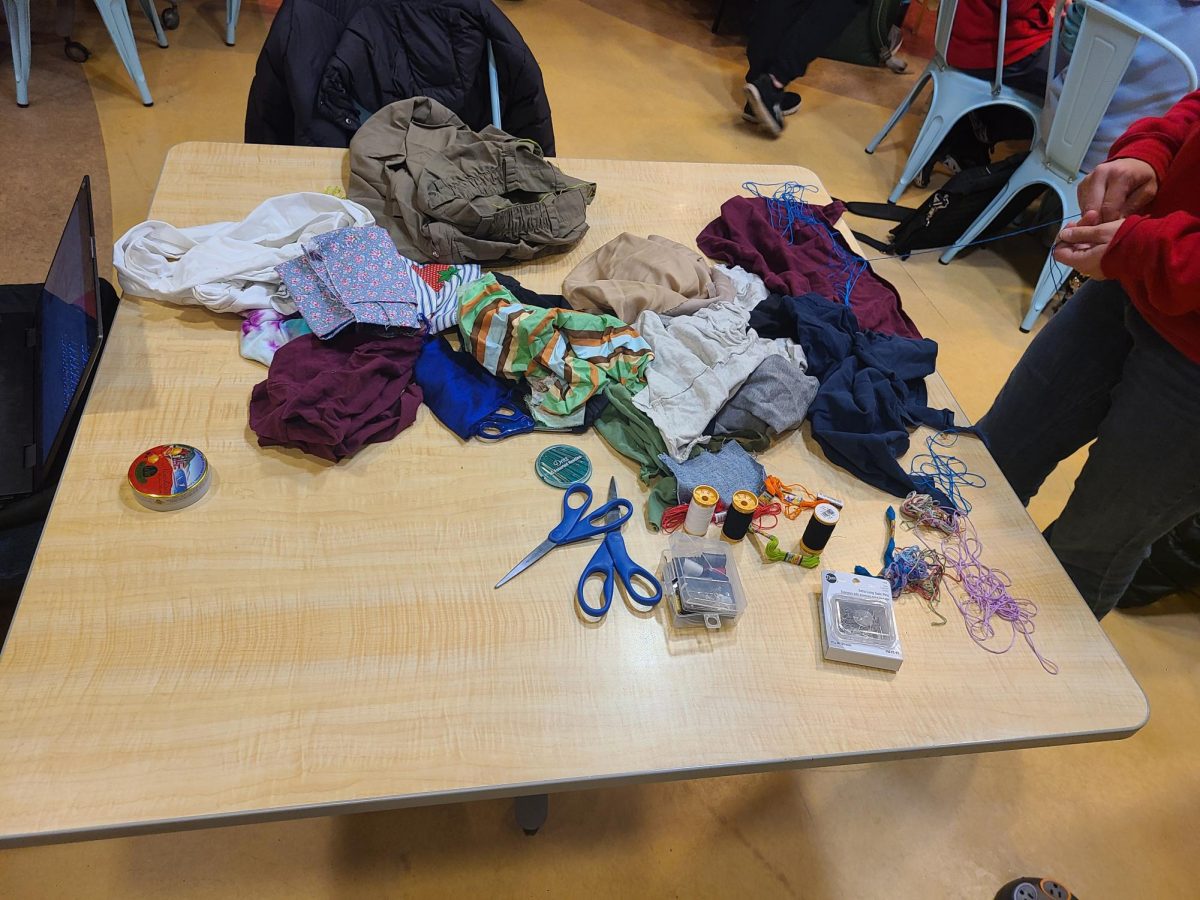 Students for Environmental Action supplied a variety of supplies that attendees could use to repair their clothing at the mending workshop in Grounds for Change on Nov. 30.