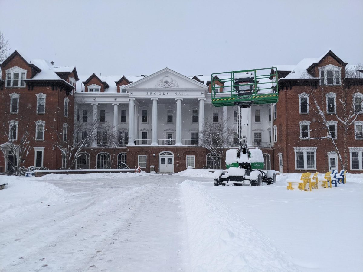 After over a week of the front entrance to Brooks Hall being closed off, the college rented a lift to take down the banners on Friday, Jan. 19.