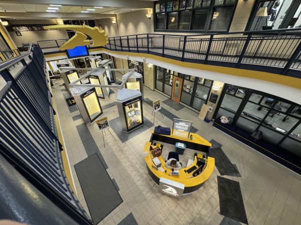 A view of the Wise Center lobby from the second-floor balcony; the “Walk of Fame” occupies a space once filled by a seating area. The front desk has also been moved.