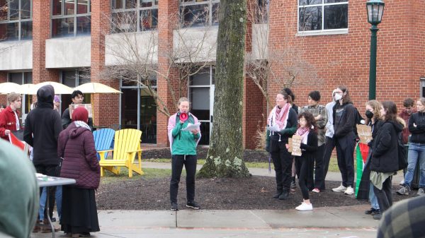 Julia Sonen, ’24, speaks at a rally calling for a cease-fire in the Israel-Hamas war on Friday, Jan. 26. More than 80 students spent the lunch hour gathering to call government representatives and mourn the civilian lives lost in the war.