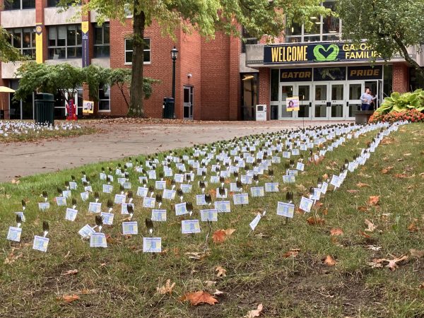 Sporks impaled in the Gator Quad lawn line the pathway to the entrance of the Henderson Campus Center as part of the Office of Sustainability’s #SporkTheQuad event on Monday, Sept. 23.