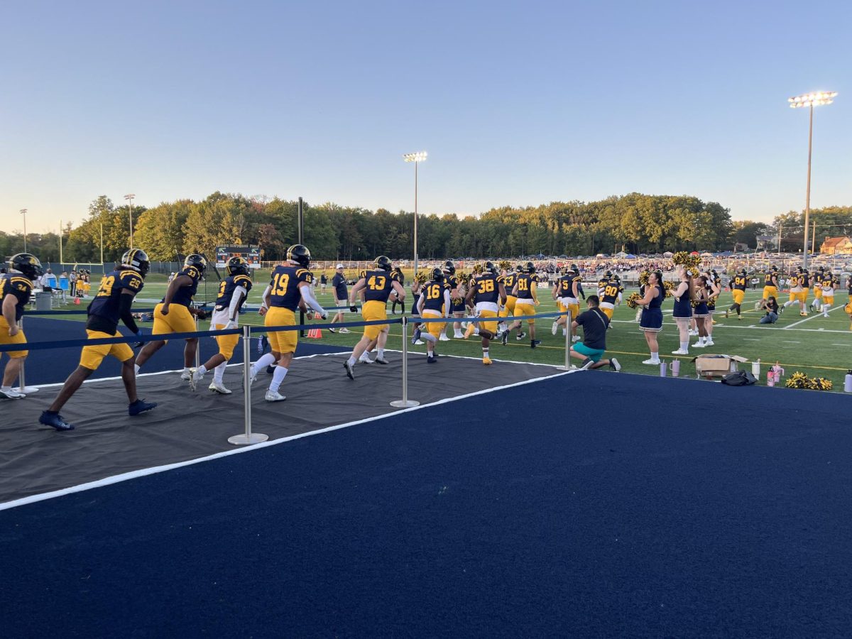 The Allegheny football team takes the field at the Blue & Gold Weekend game against Westminster College on Saturday, Sept. 21.