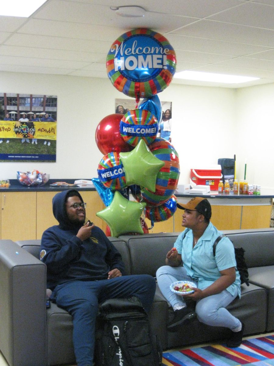 Gary Murray, ’26, and Akida Nooha, ’27, talk in the newly remodeled IDEAS Center extension space during the IDEAS Center’s first day of school coffee and donuts event on Tuesday, Aug. 27.