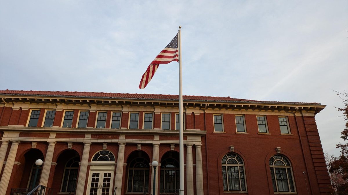 An American flag flies outside the Tippie Alumni Center on Wednesday, Oct. 30. Since Pennsylvania is a swing state, many students are experiencing the full force of the 2024 presidential campaigns.