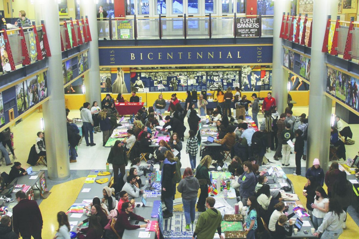 Students gather in the Henderson Campus Center at the Spring Involvement Fair on Thursday, Jan. 16, A variety of student organizations presented to potential new members.