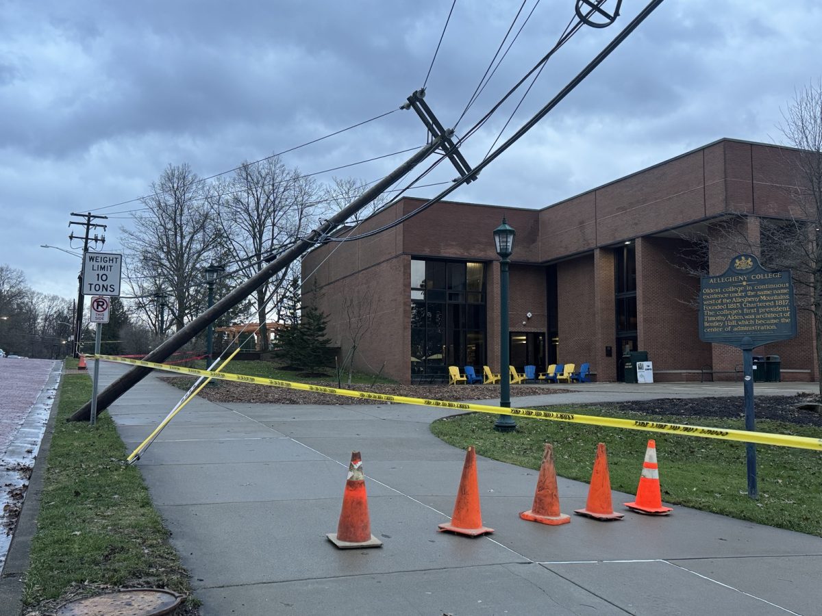 A utility pole leans toward the Lawrence Lee Pelletier Library after a severe weather emergency on Wednesday, March 11. East College Street and the library were closed starting in the early evening, and students were warned to avoid the affected area until the pole was repaired on Saturday, March 14.