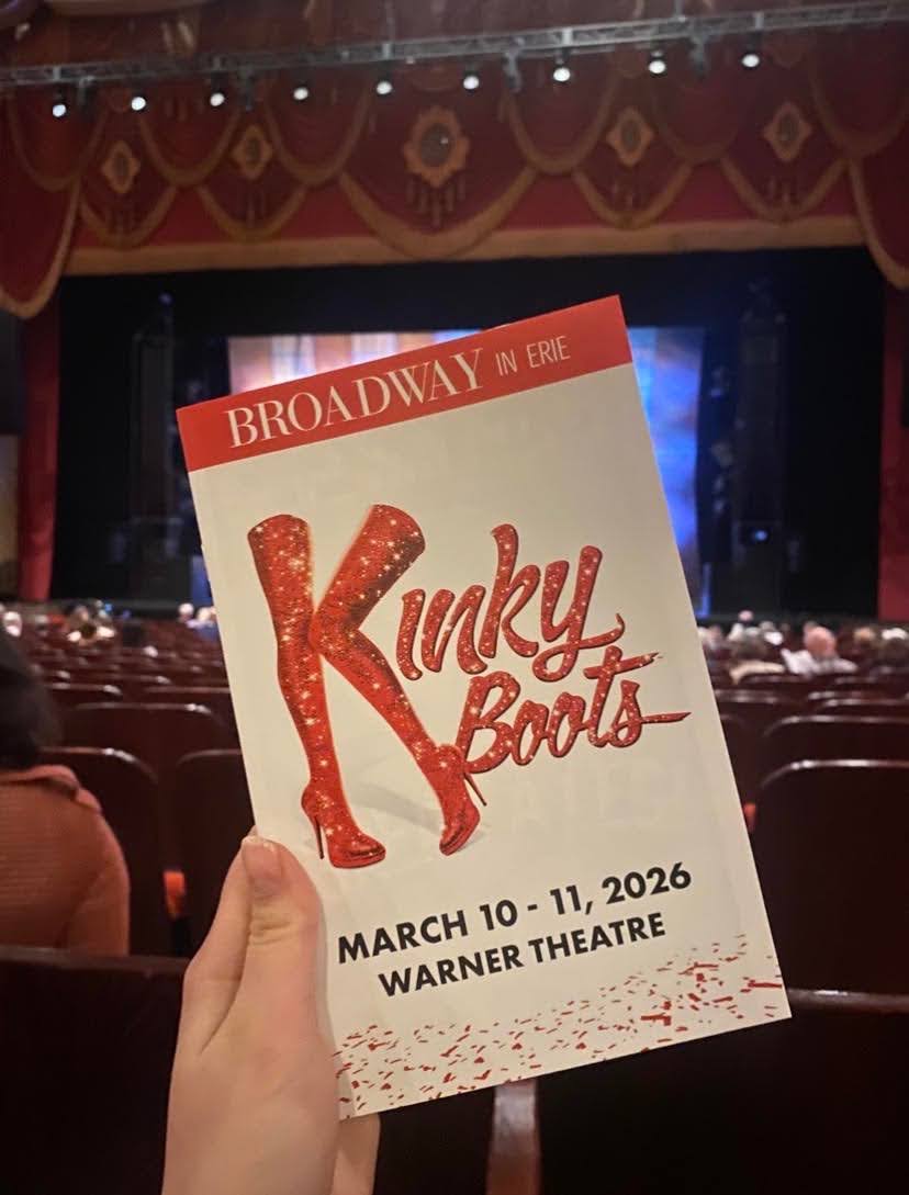Staff Writer Willow Bowen, ’28, holds up her ‘Kinky Boots’ playbill at the Warner Theatre in Erie on Tuesday, March 10.