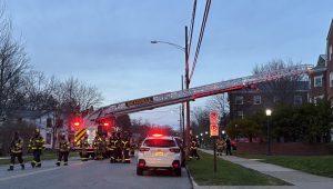 A Meadville fire truck extends an aerial ladder onto the roof of Brooks Dining Hall while responding to a 911 call about a potential structural fire on Sunday, April 12. 