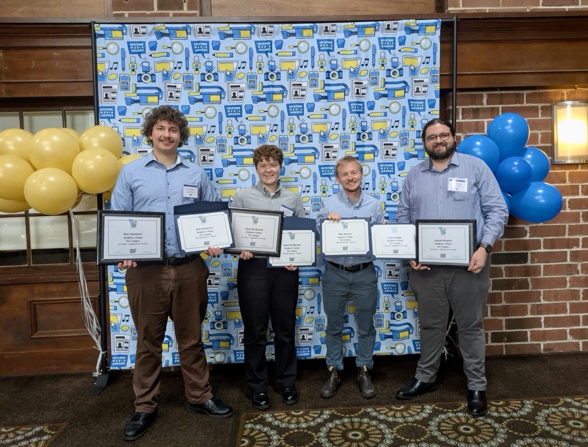 Staff Writer Ben Stavnezer, '27, Editor-in-Chief Anna Westbrook, '26, Opinion Editor Milo Watson, '26, and Staff Writer Joseph Klepeis, '26, pose with awards the staff received last week at the Pennsylvania NewsMedia Association’s Student Keystone Media Awards in Harrisburg.