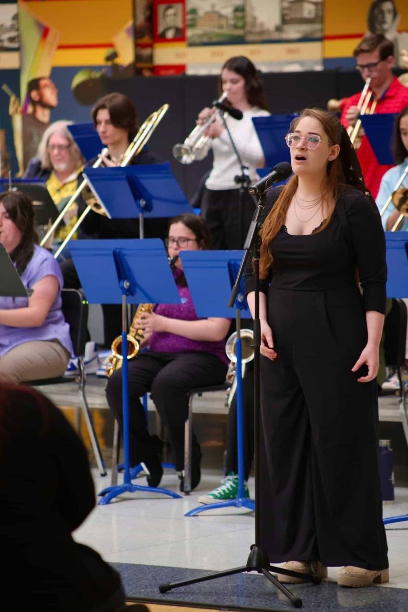Rae Robinson, '26, sings 'Over the Rainbow' with the jazz band on Sunday, April 19.